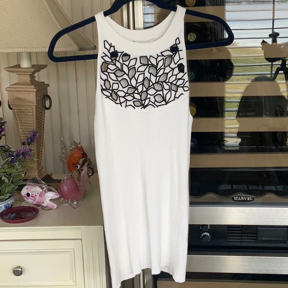 White House black-market Tops - White House Black market white tank top with pretty black cut out design…